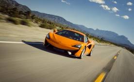 McLaren-Sport-Series-570S-Orange-Driving-Front